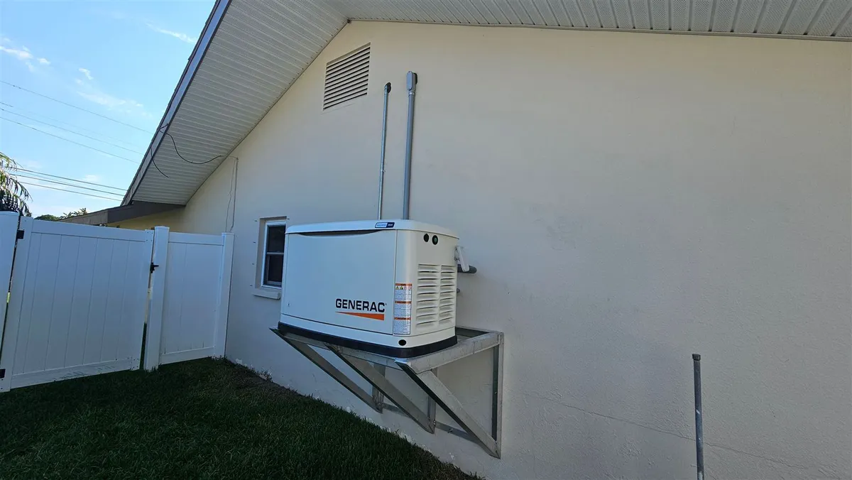 Standby generator installed beside a home