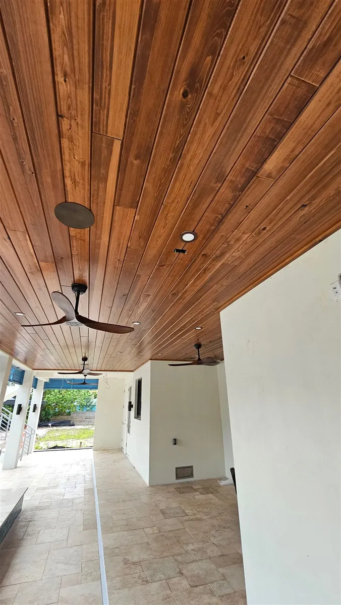 Outdoor ceiling fans on a covered lanai