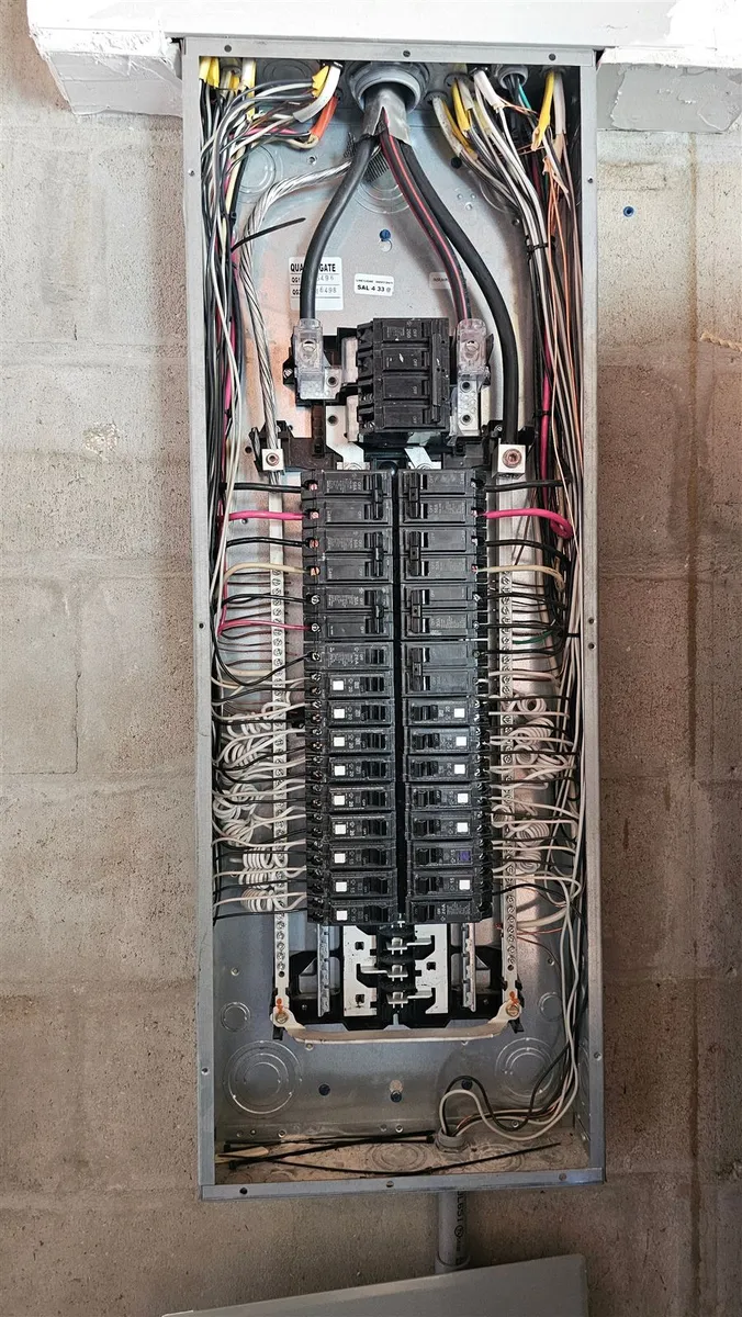 Old electrical panel before replacement