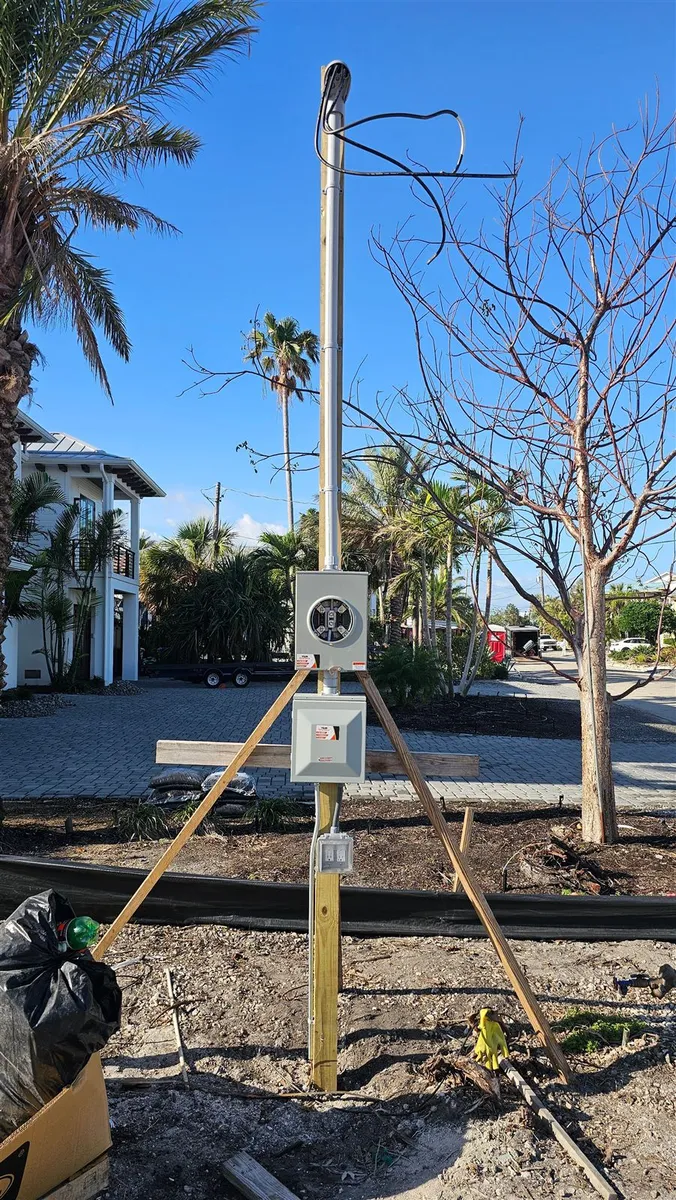 Temporary power pole at a construction site